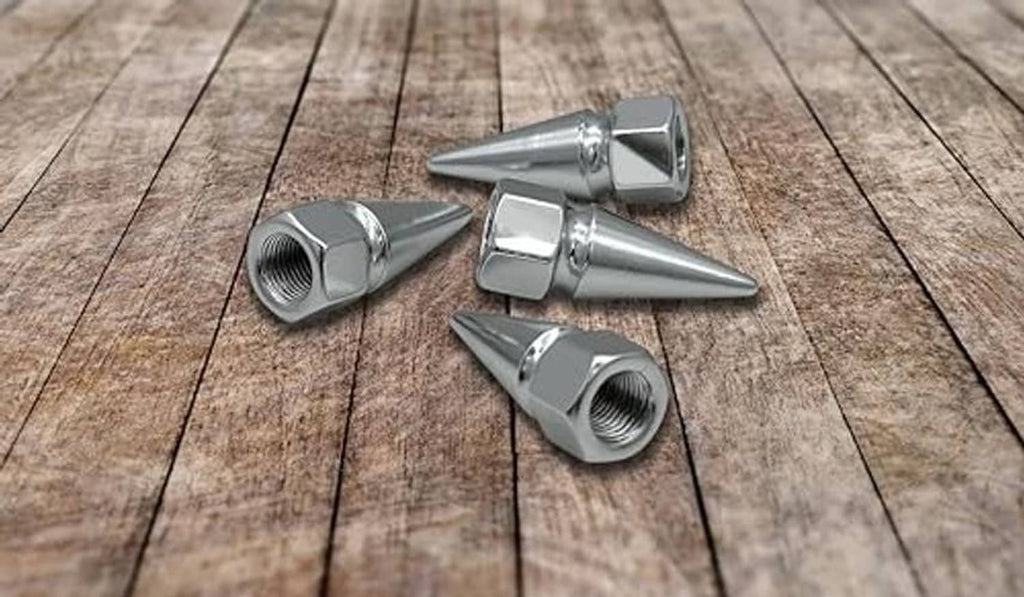 Chrome spike valve stem caps on wooden surface, universal fit, 4-pack