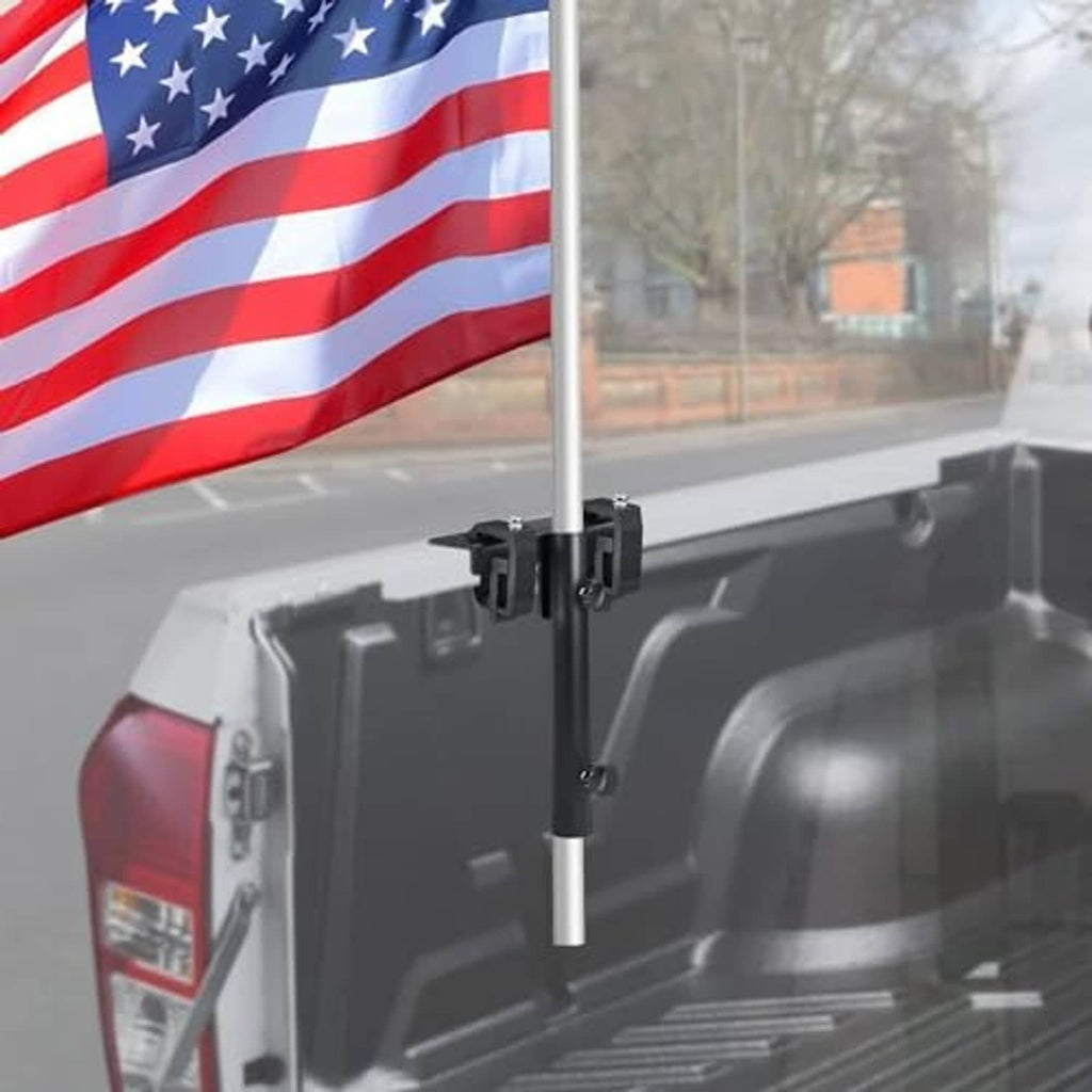 No-drill side flag pole mount kit showing black clamp bracket holding a pole