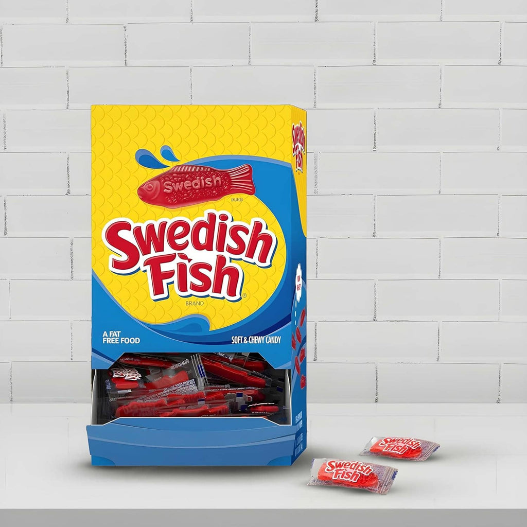 Swedish Fish bulk candy box with one small individually wrapped gummy packet