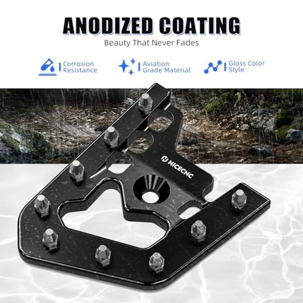Black anodized brake pedal lever extender plate with bolt heads and rubber insert