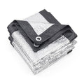 Folded reflective silver shade cloth tarp with dark straps and corner grommet
