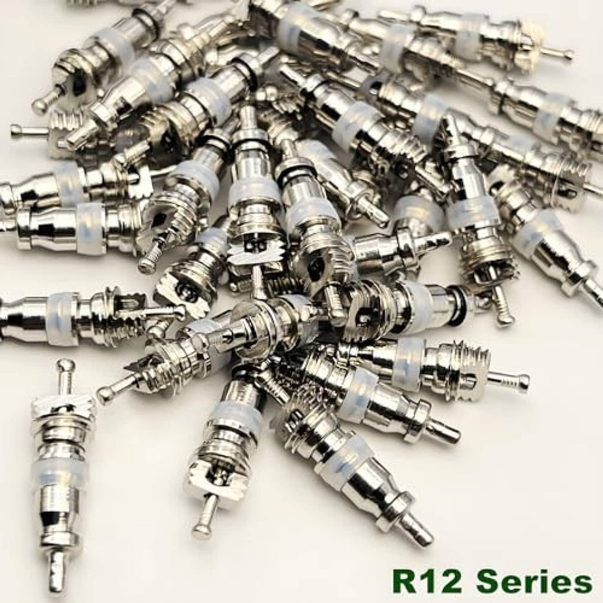 Bulk set of metal Schrader valve cores with black rubber tips