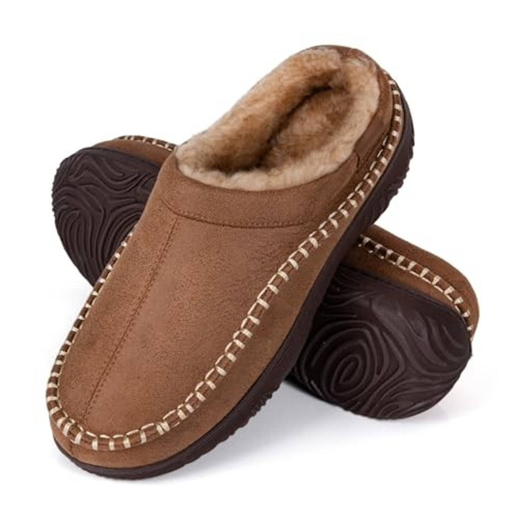 Pair of tan moccasin slippers with fuzzy lining and patterned dark rubber sole