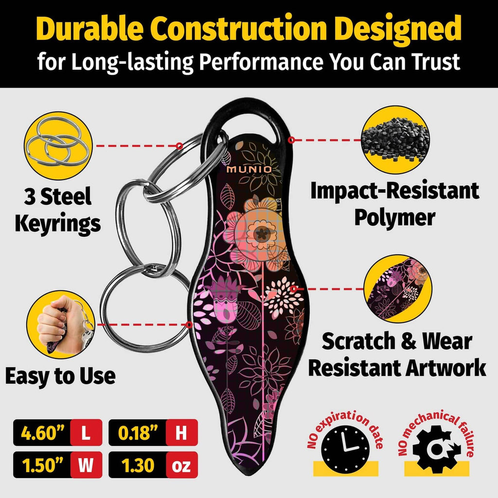 Self defense keychain blade with black background and pink floral artwork on keyring