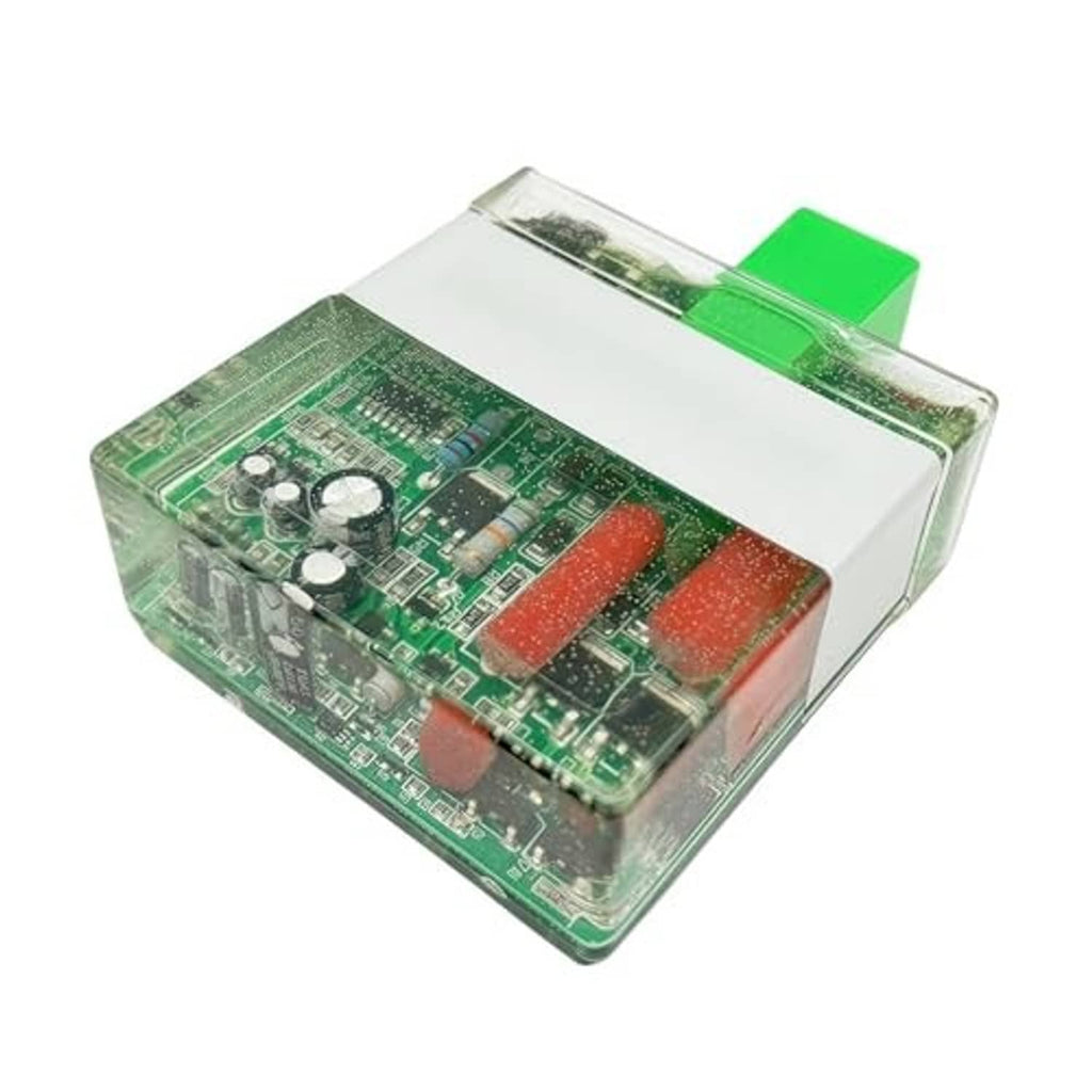 CDI box ignition control unit showing green PCB, clear cover, and red component inserts