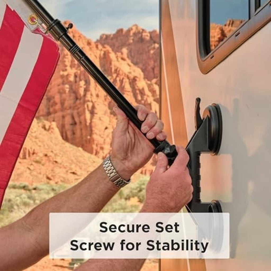 Black suction flagpole holder installed on RV wall with secure pole clamp