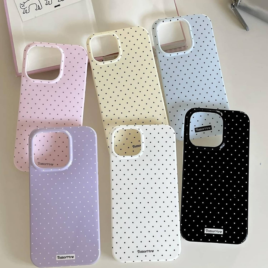 Light blue dotted iPhone 13 Pro case with camera opening and bottom port