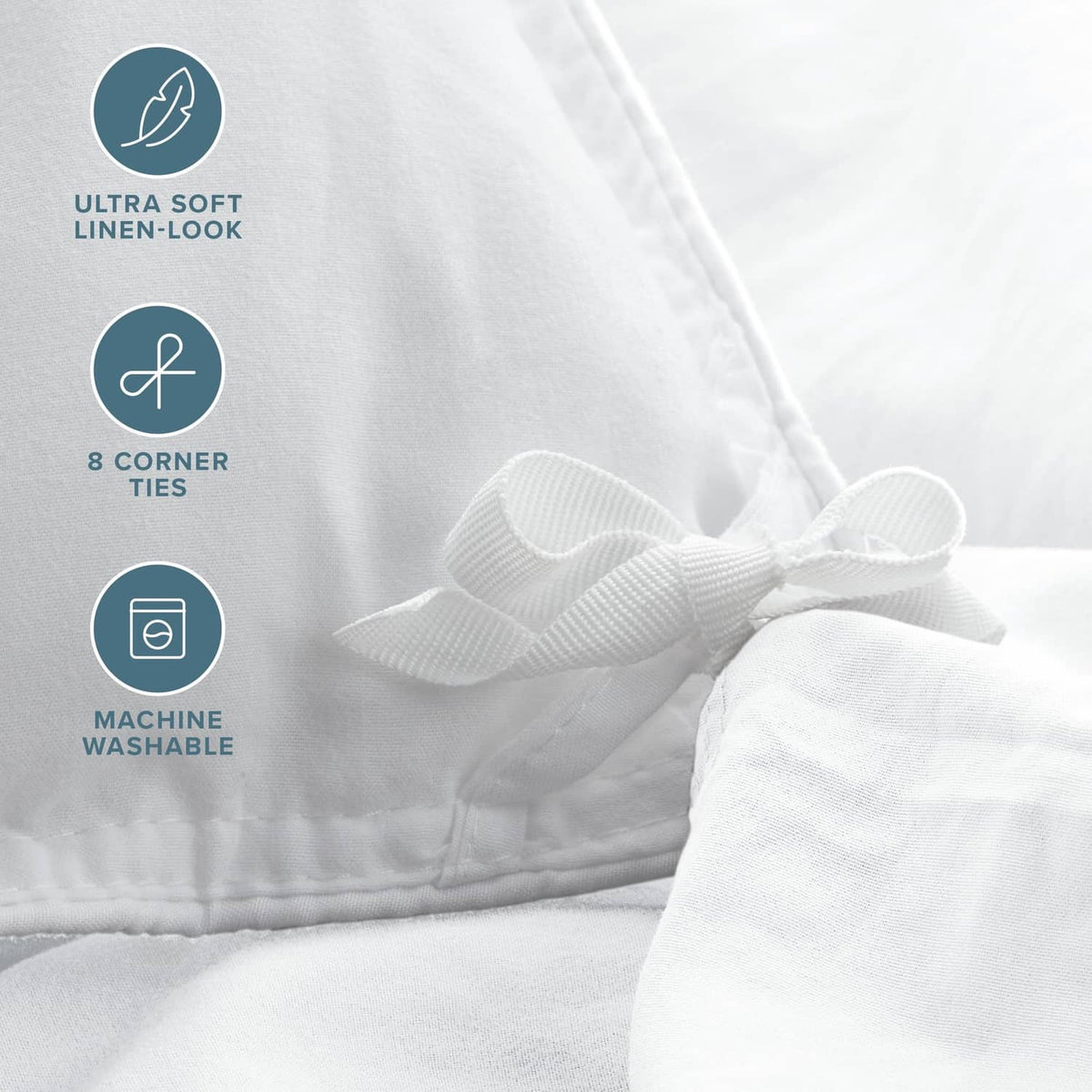 White duvet cover fabric close-up with corner ties and bow