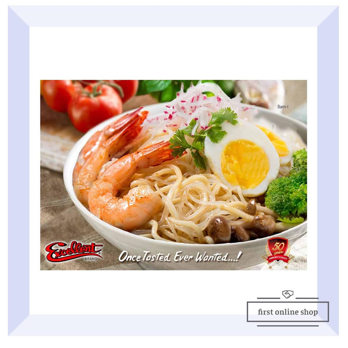Bowl of pancit noodles with shrimp, egg, broccoli, and parsley
