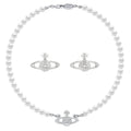 White pearl choker necklace with silver Saturn pendant and two stud earrings
