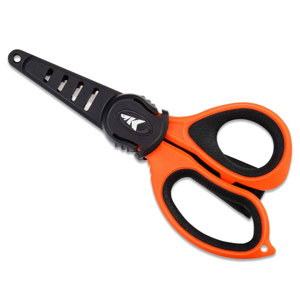 Orange-and-black fishing line scissors with black blade guard and thumb grip