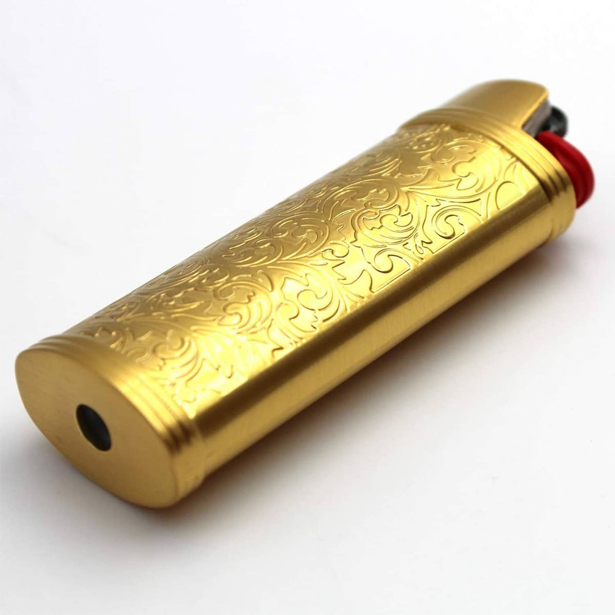 Gold metal lighter case with floral embossing and rounded base