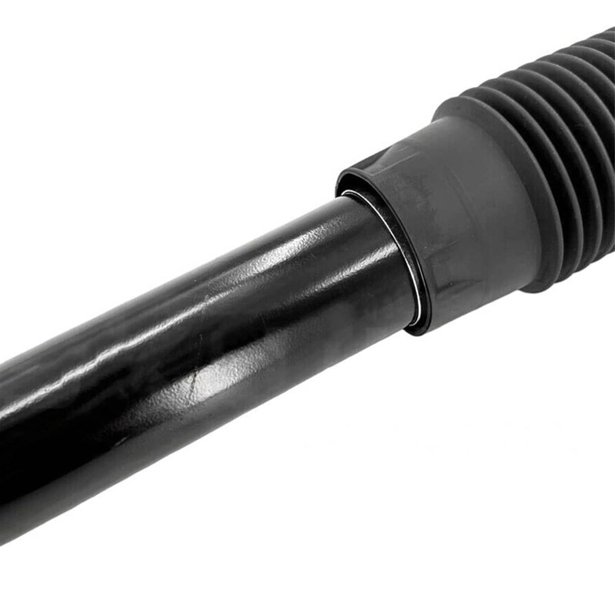 Magnetic shock absorber close-up of black ribbed boot and smooth cylinder surface
