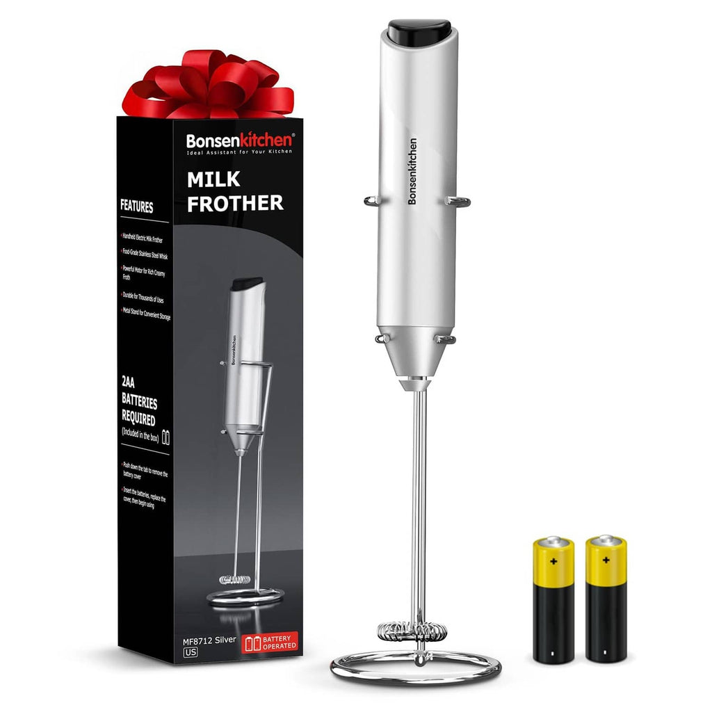Silver milk frother with stand and whisk, plus two spare battery capsules