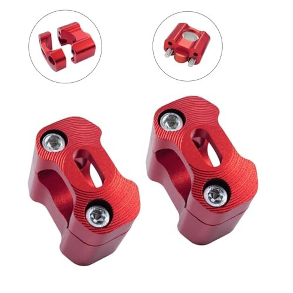 Red handlebar riser clamp pair with metal hardware, showing top bolt and side cutouts