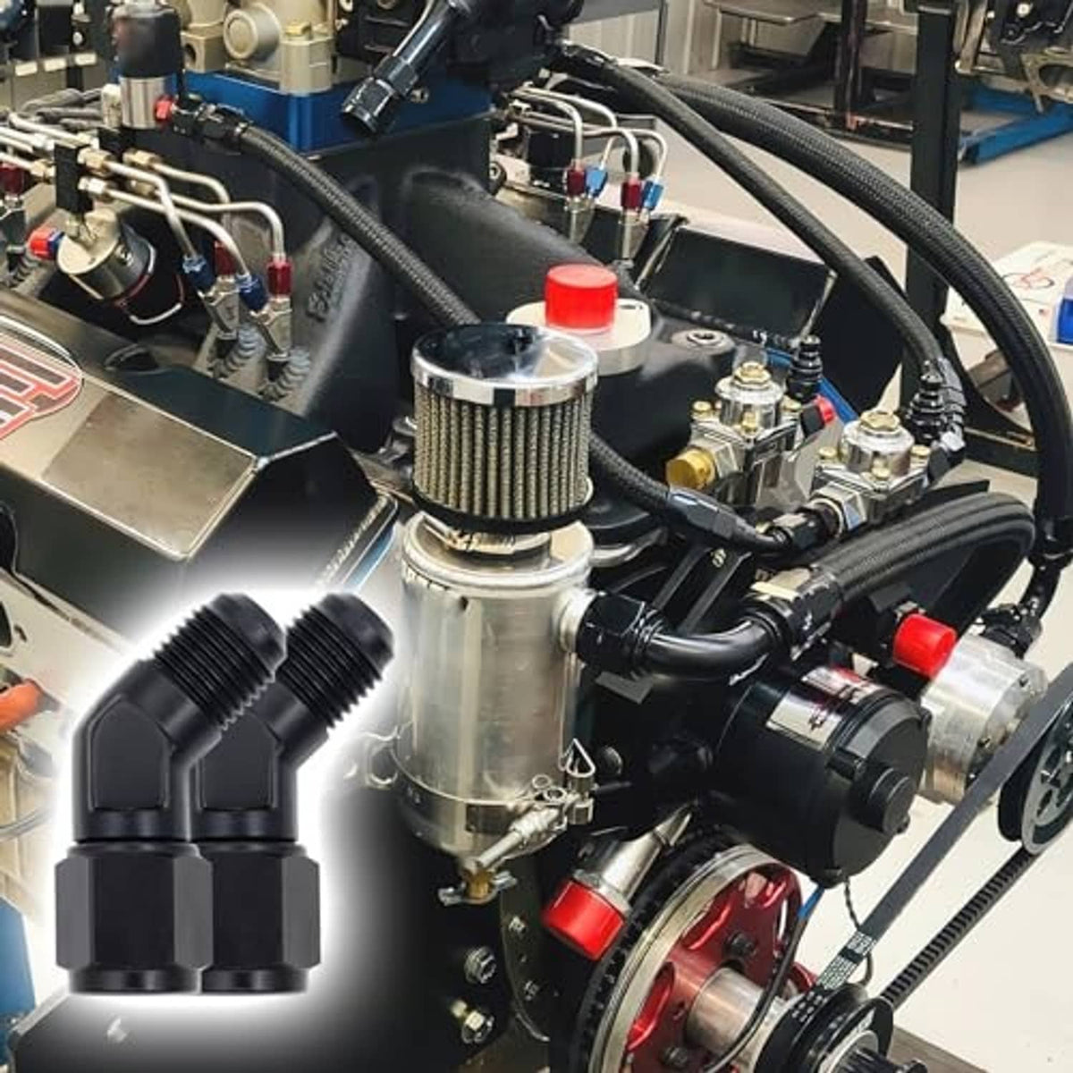 2-pack black 45-degree swivel flare fittings on an engine plumbing setup