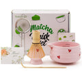 Pink 5-piece matcha set with ceramic bowl, bamboo whisk, strainer, scoop, gift card