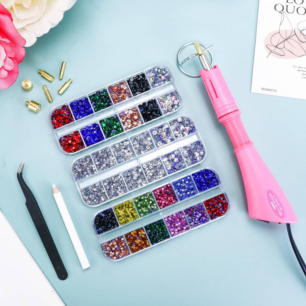 Hotfix rhinestones organizer trays with pink applicator tool and styling tweezers