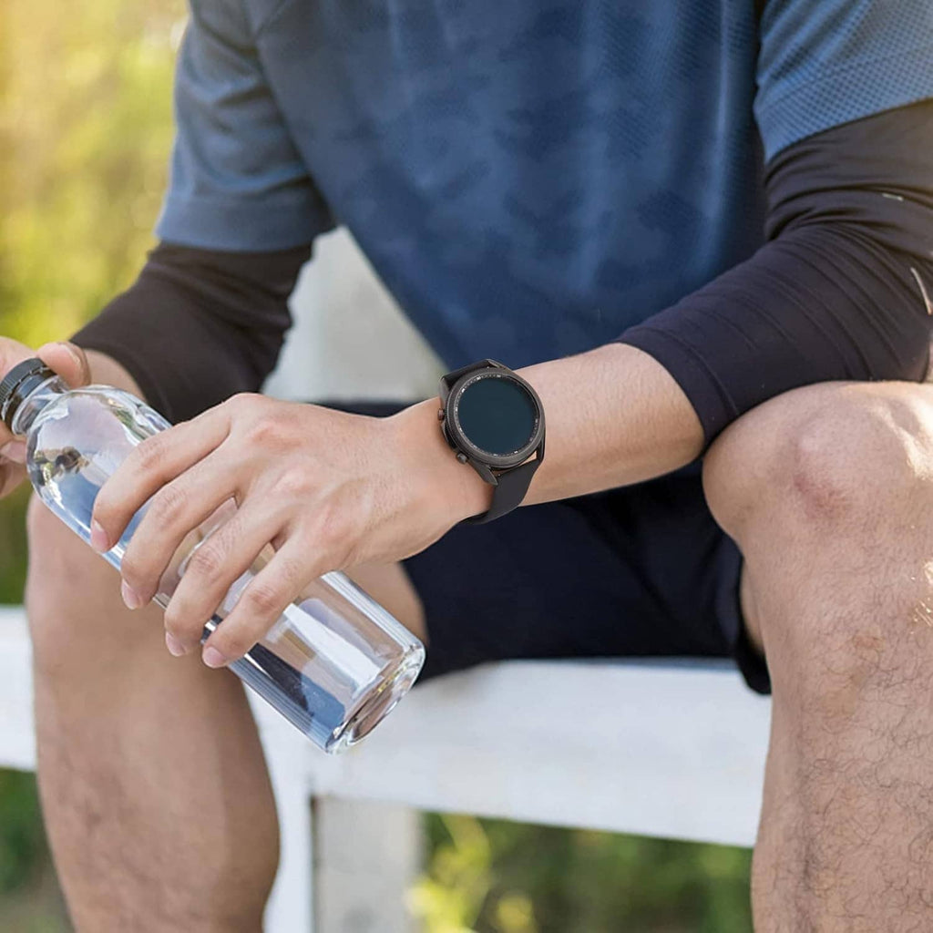 Blue silicone watch band on smartwatch on wrist, quick-release fit and strap holes