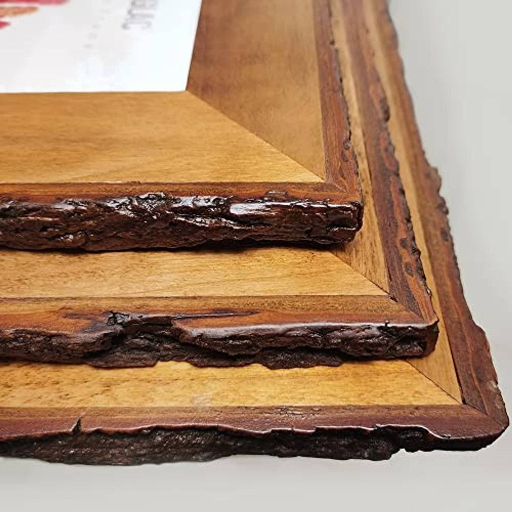 Rustic wood picture frame corner with textured live-edge trim and darkened finish