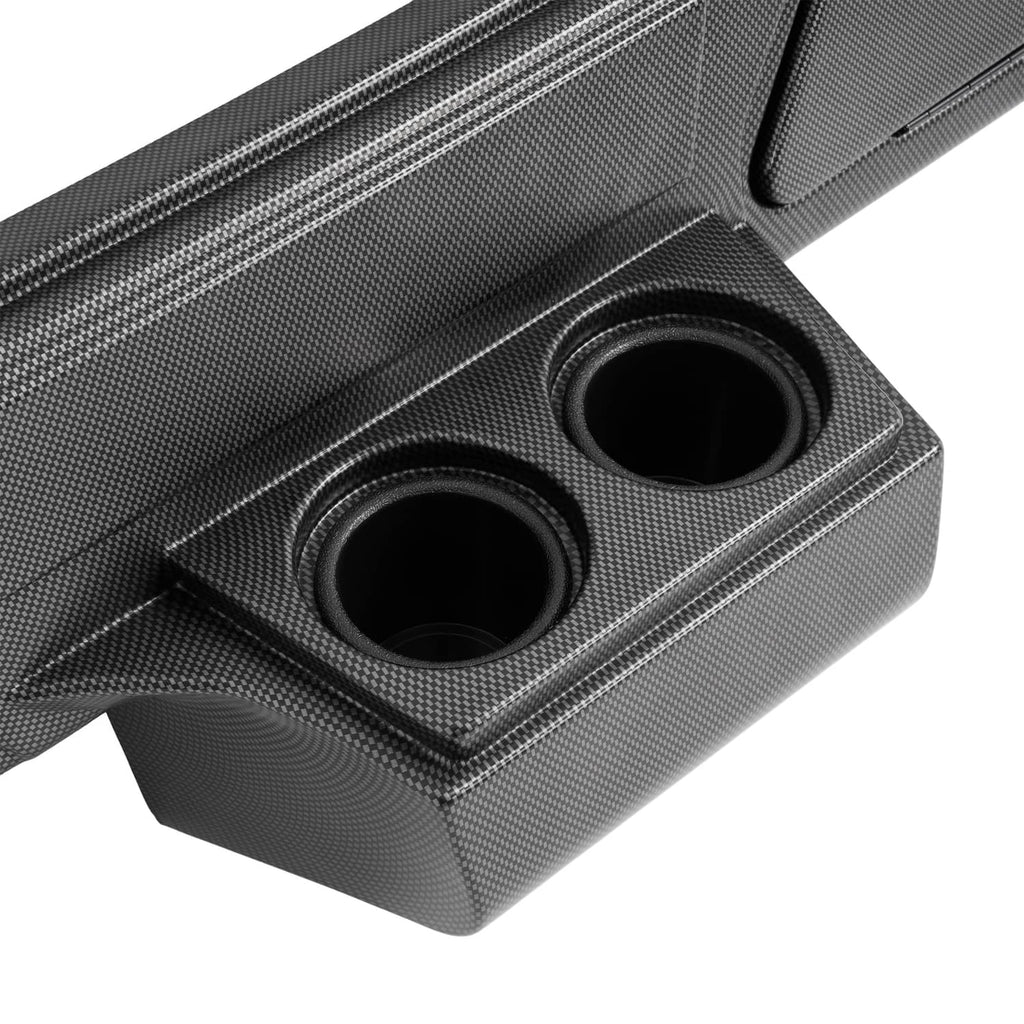 Carbon fiber style dash cover with dual cup-holder openings and molded speaker cutouts