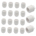 Set of white PVC male threaded pipe end caps, 1/2 inch, ribbed plug pieces
