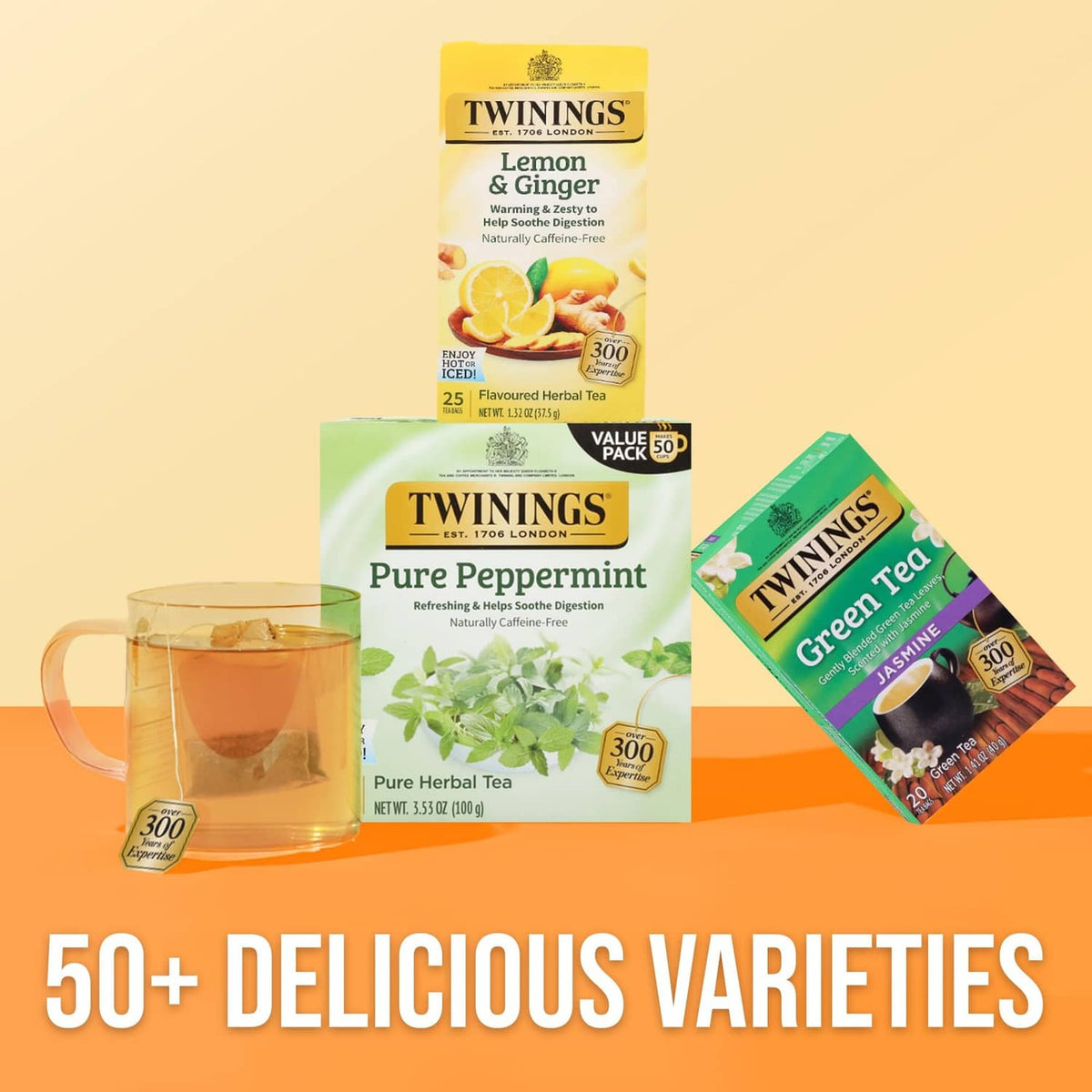 Twinings tea assortment with Lemon & Ginger box, cup, and multiple tea packs