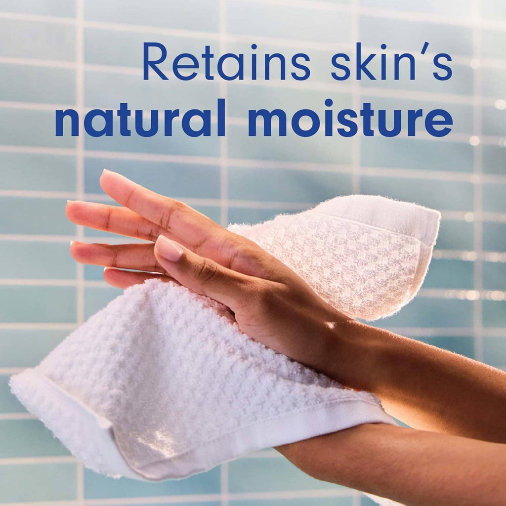 Hand holding a towel after using Softsoap juicy peach liquid hand soap