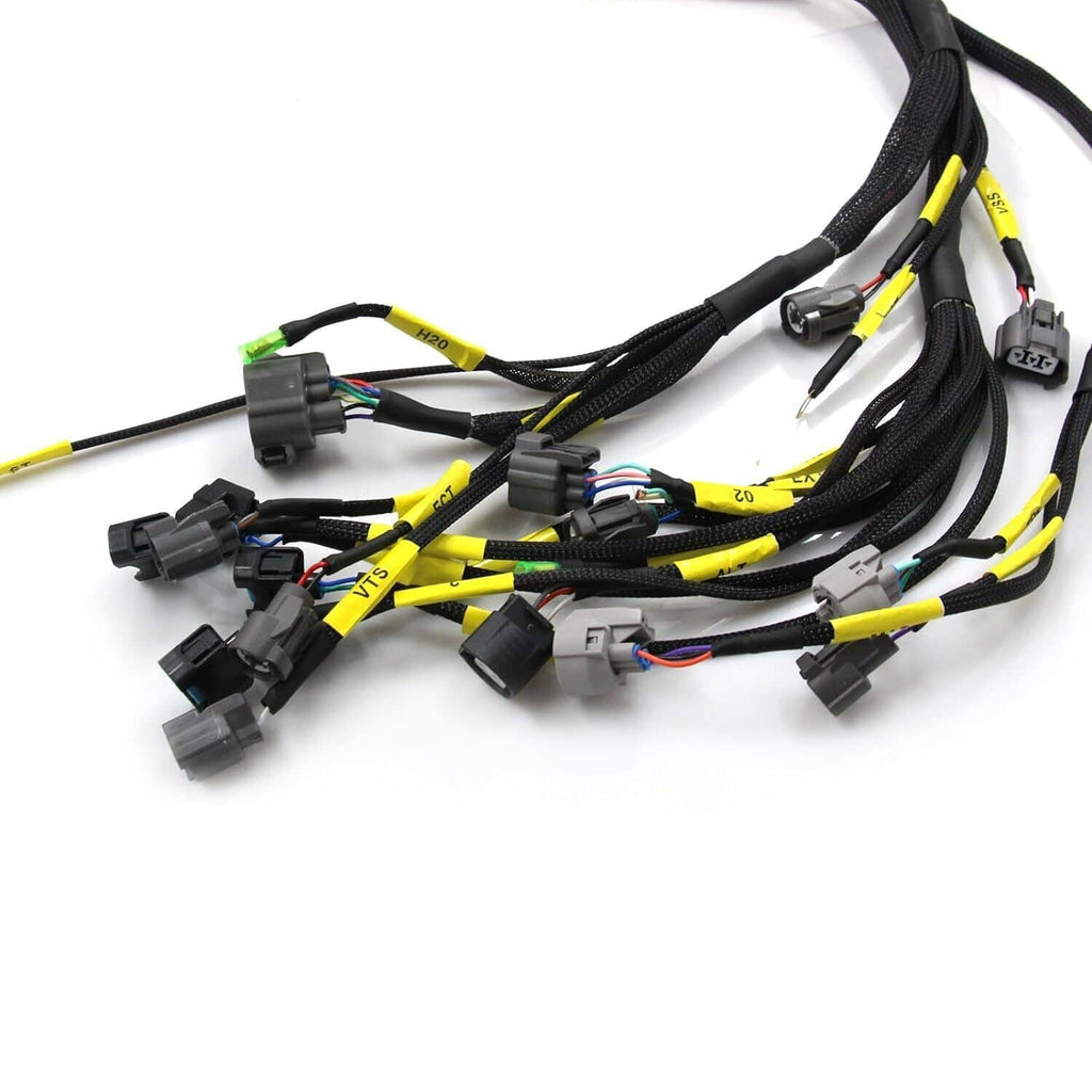 Engine wiring harness with black cable loom and yellow tracer wires with plugs