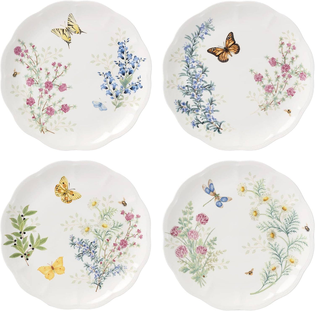 Set of 4 white dinner plates with butterfly details and herb meadow floral border accents.