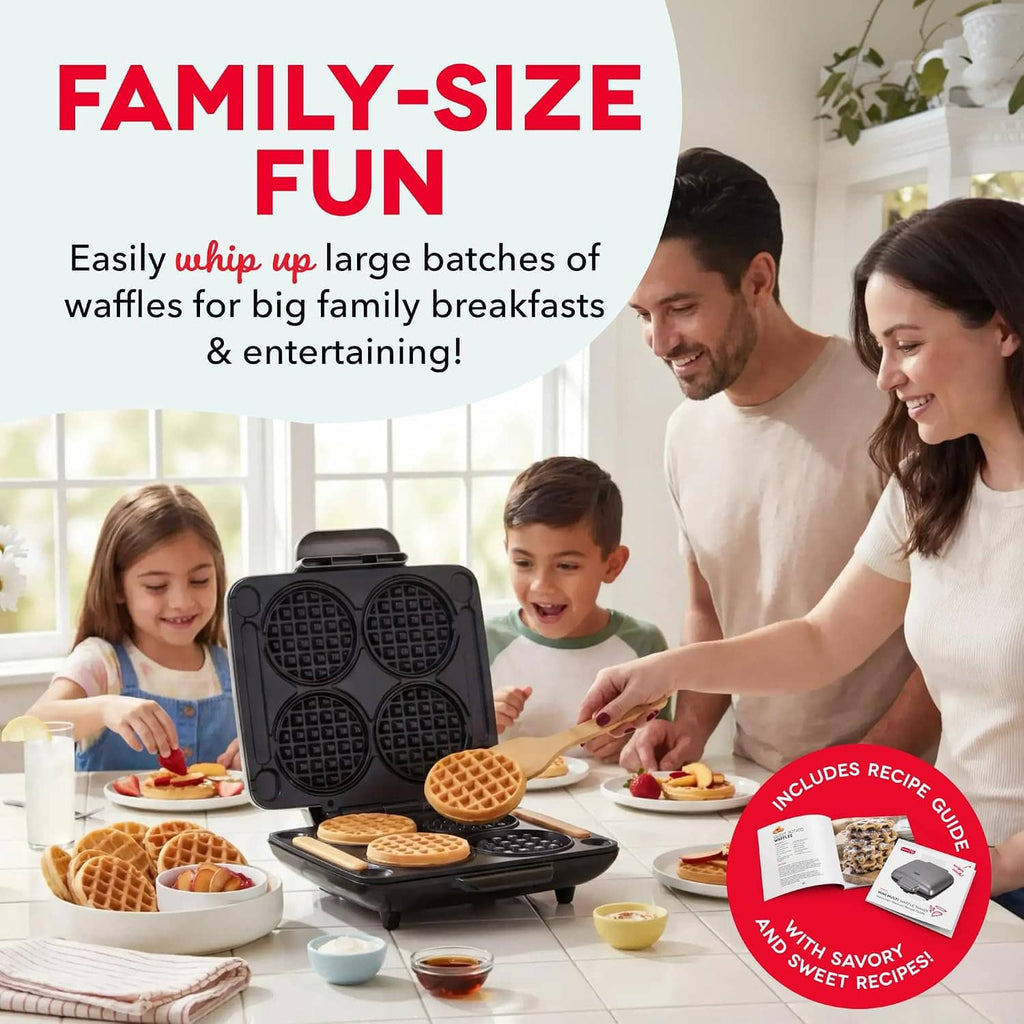 Mini waffle maker with four waffle plates on table, surrounded by breakfast dishes