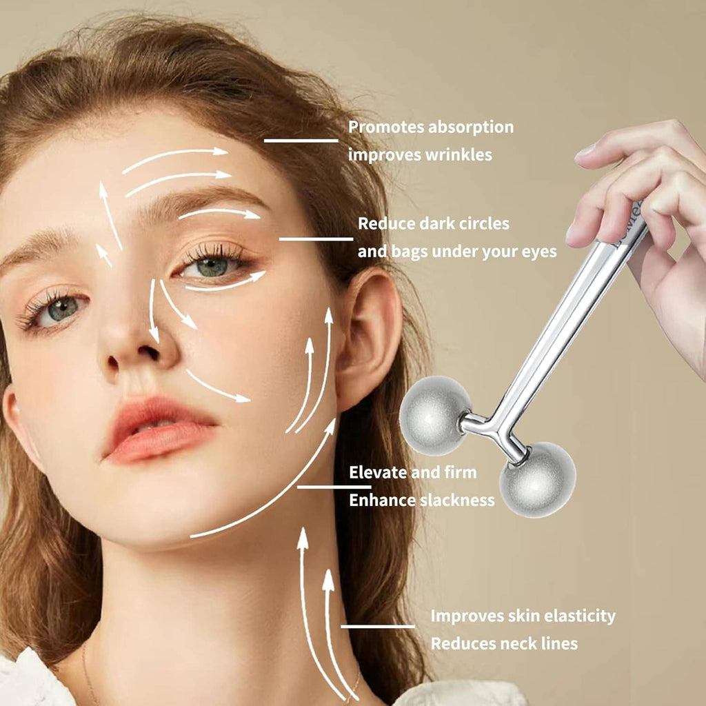 Stainless steel gua sha tool being used on facial area with scalloped edge, silver