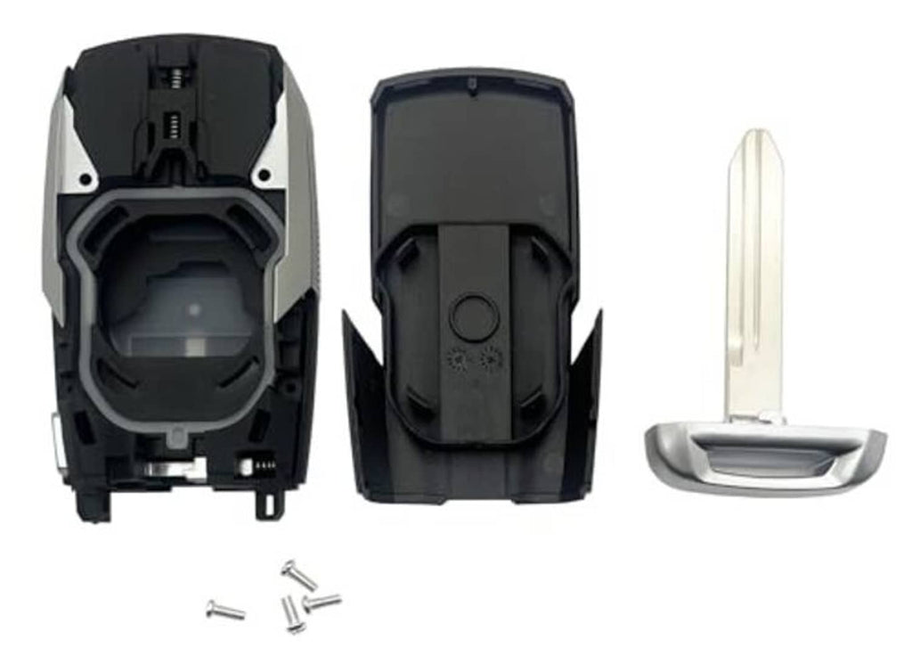 Smart key fob cover shell opened: inner housing, exterior case, and metal key blade