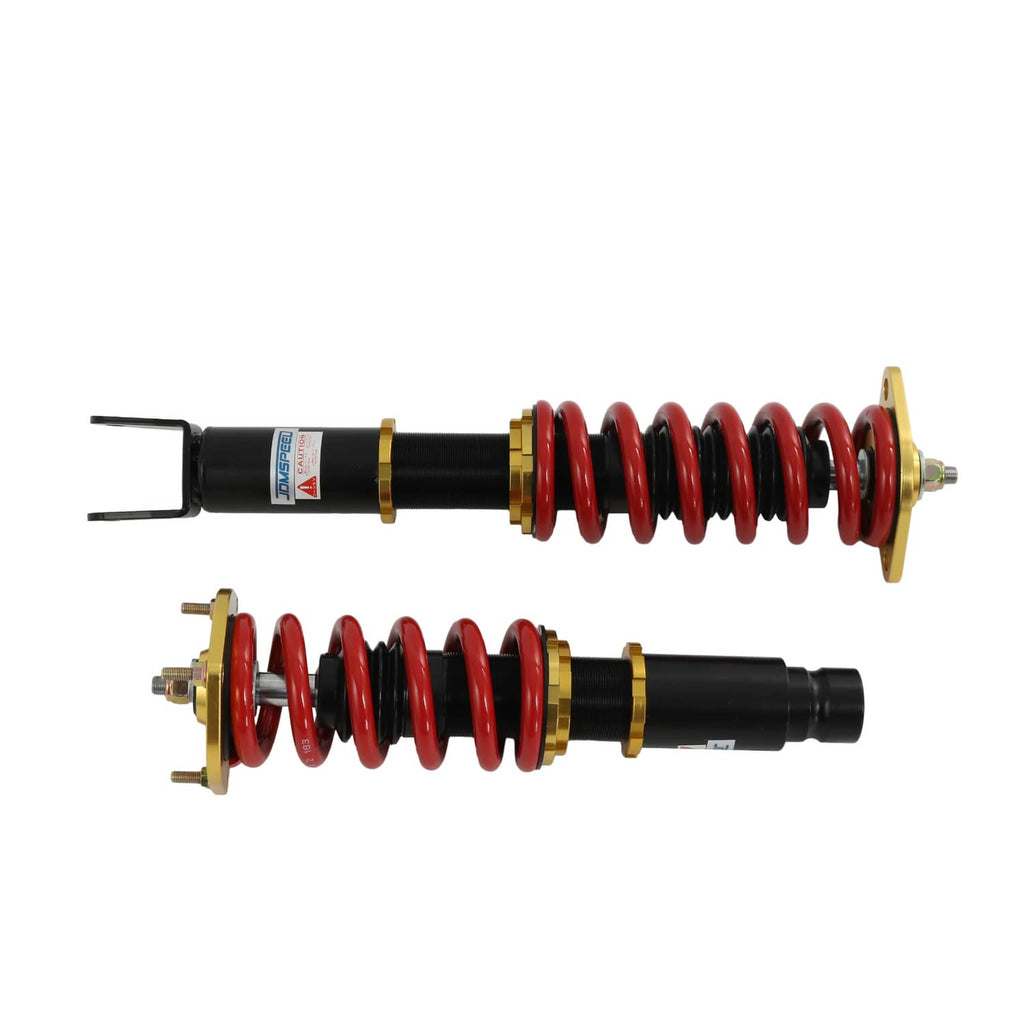 Pair of coilovers with red springs and black dampers, showing threaded body and gold hardware