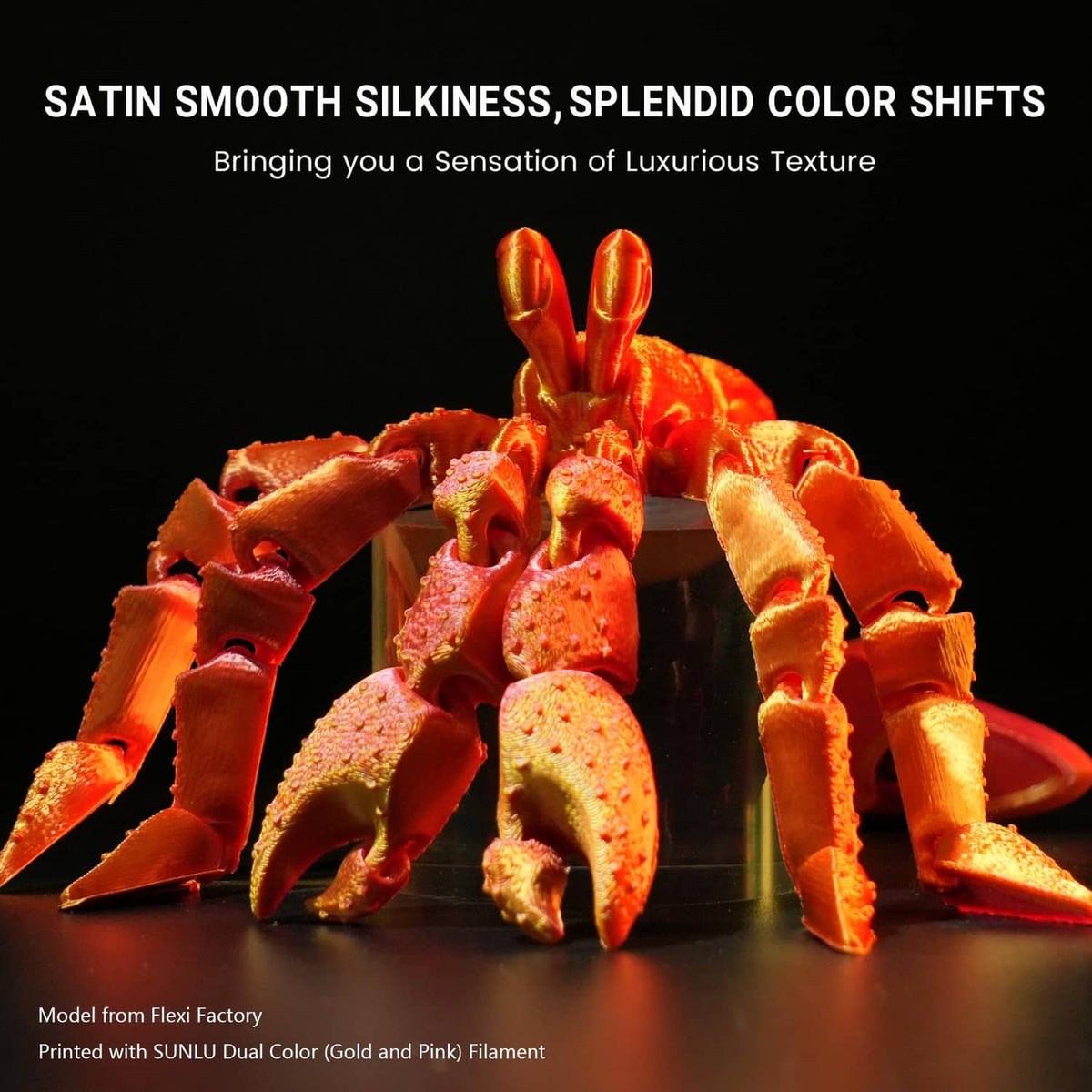 Orange and gold 3D printed figurines from silk PLA filament bundle
