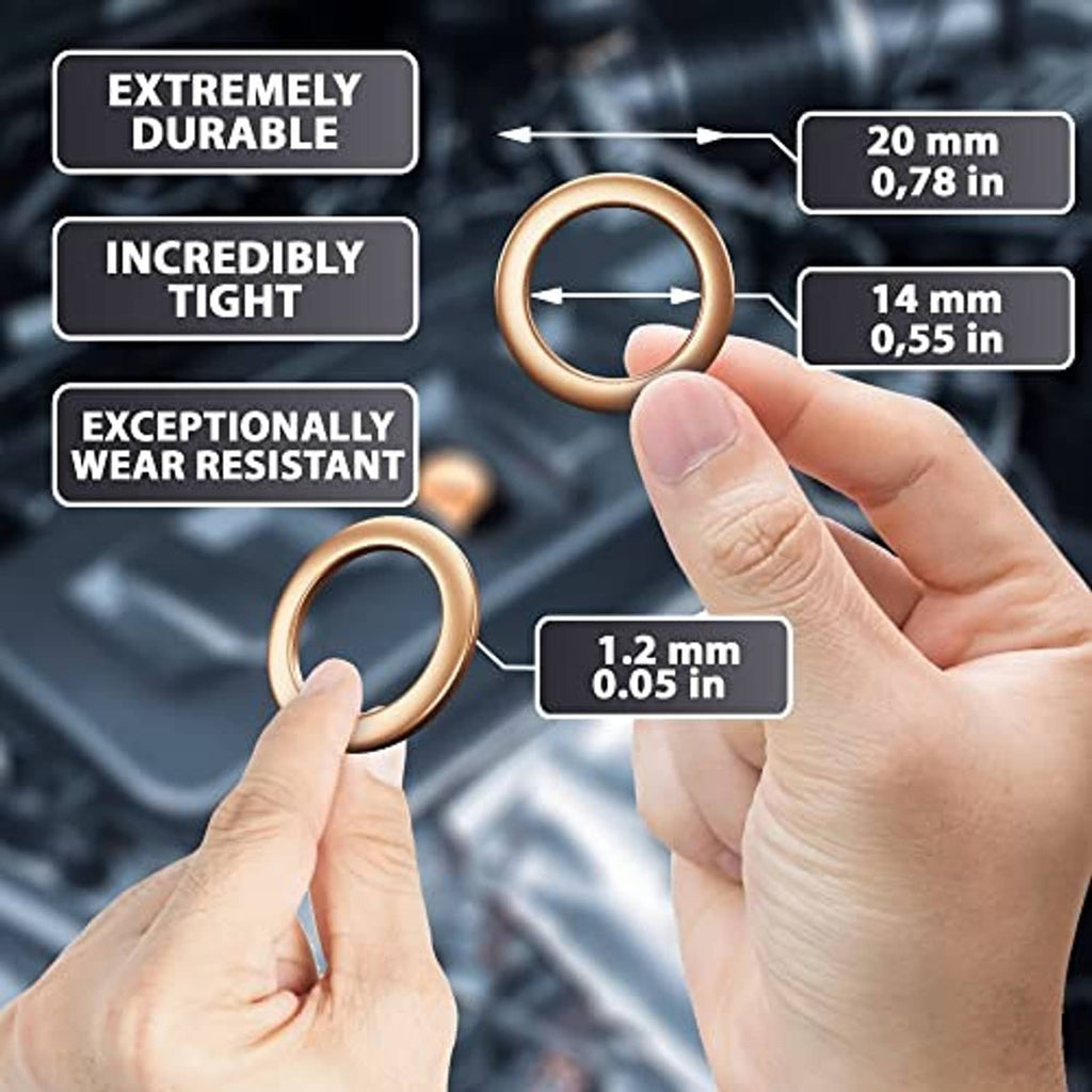 Two copper crush washer rings held in hands