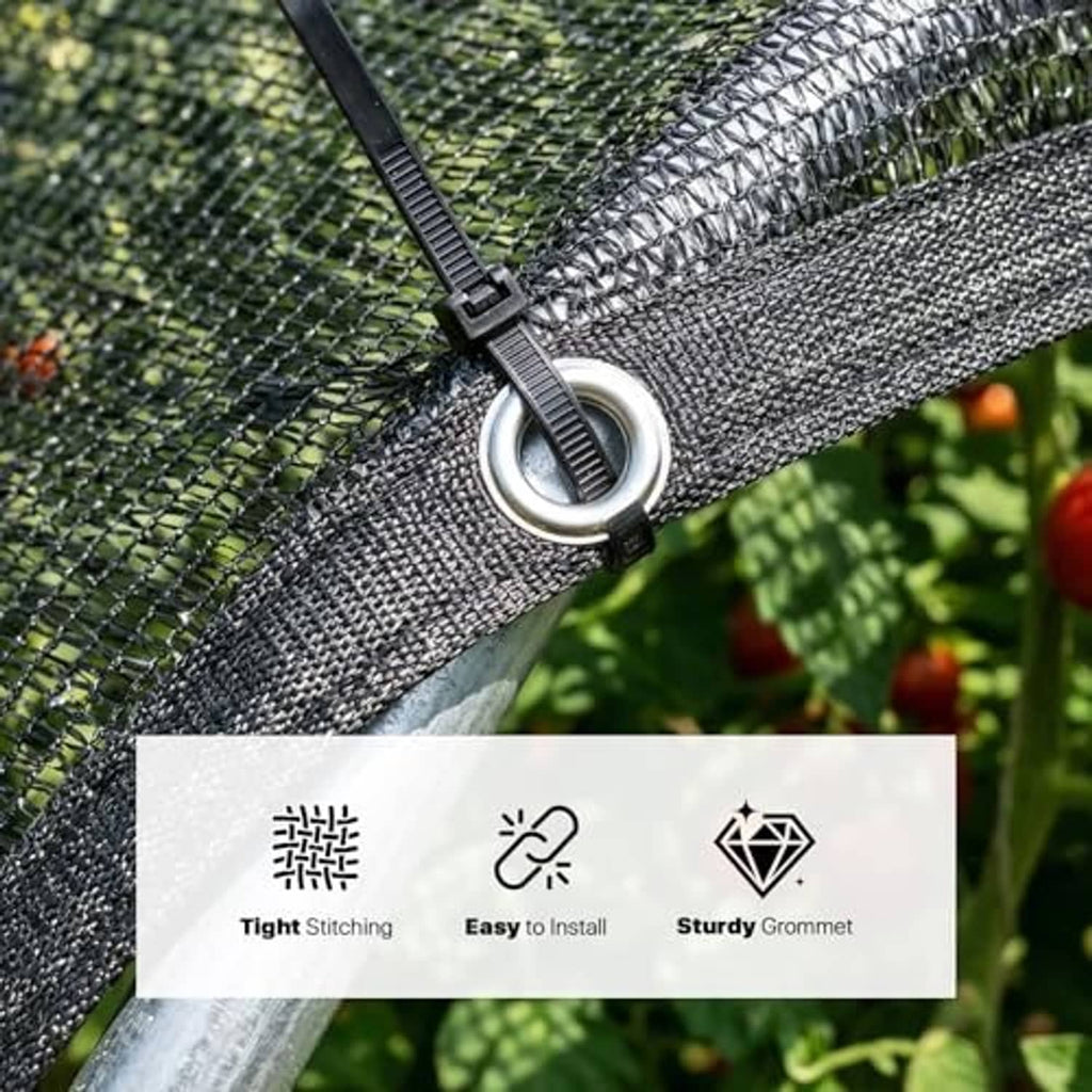 Black shade cloth tarp edge with reinforced stitching and metal grommet ring