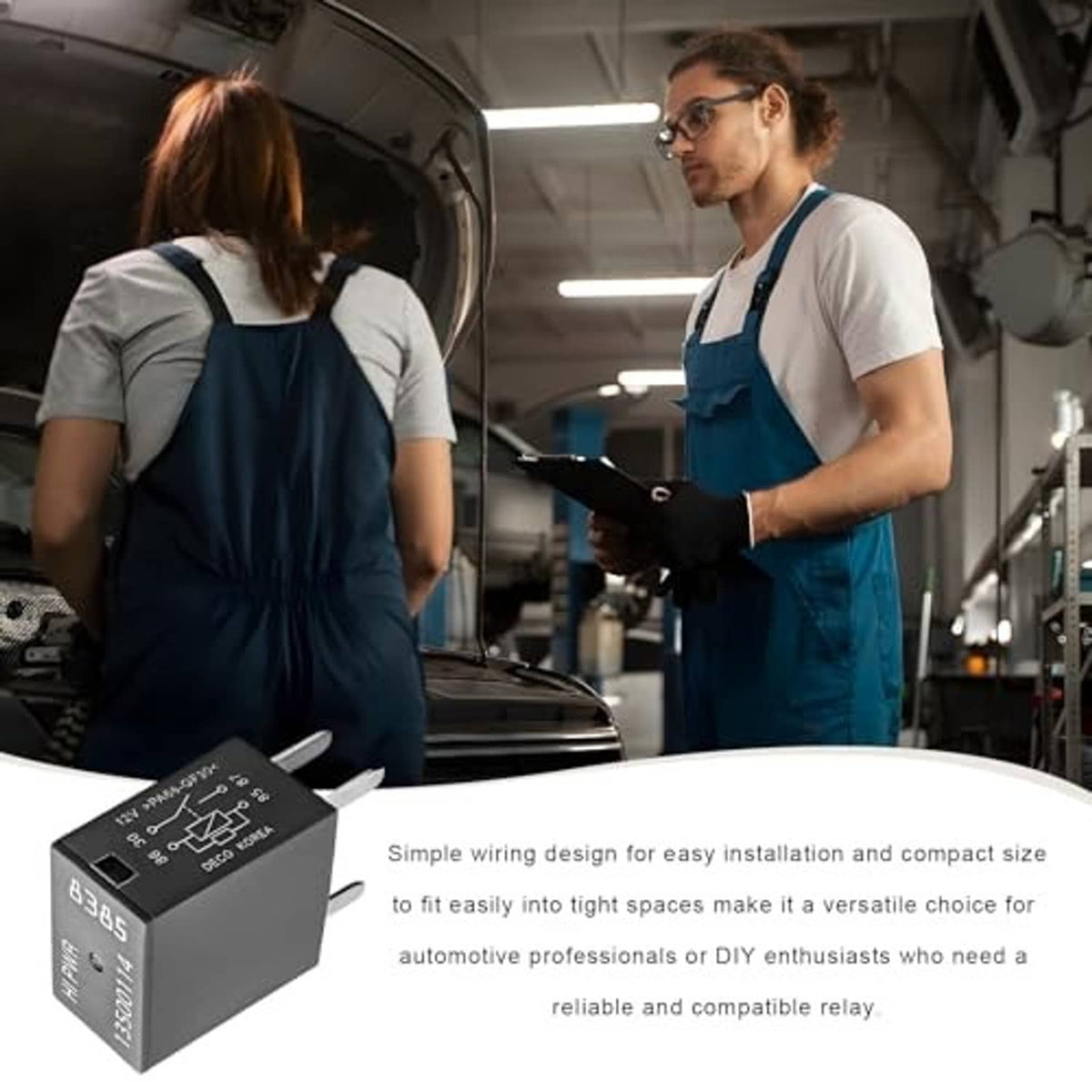 Two black two-pin relay modules with metal prongs on a work surface in auto shop