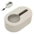 Silicone charger stand for Oura Ring Gen3 with cable base, light beige.