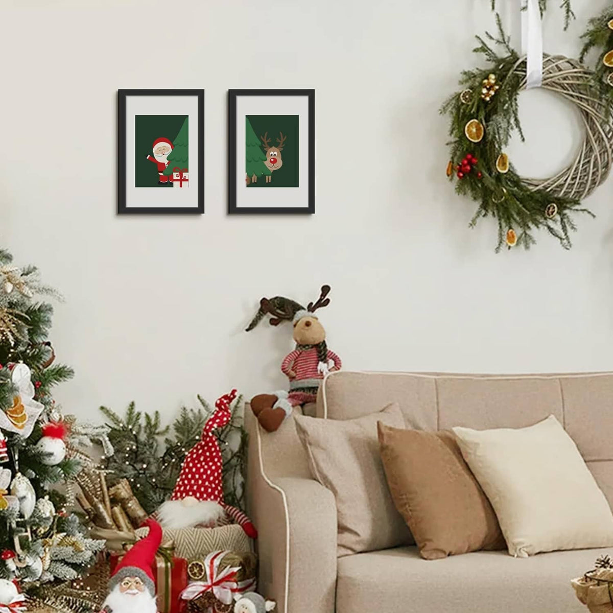 Black picture frames showing festive illustrations on a wall arrangement