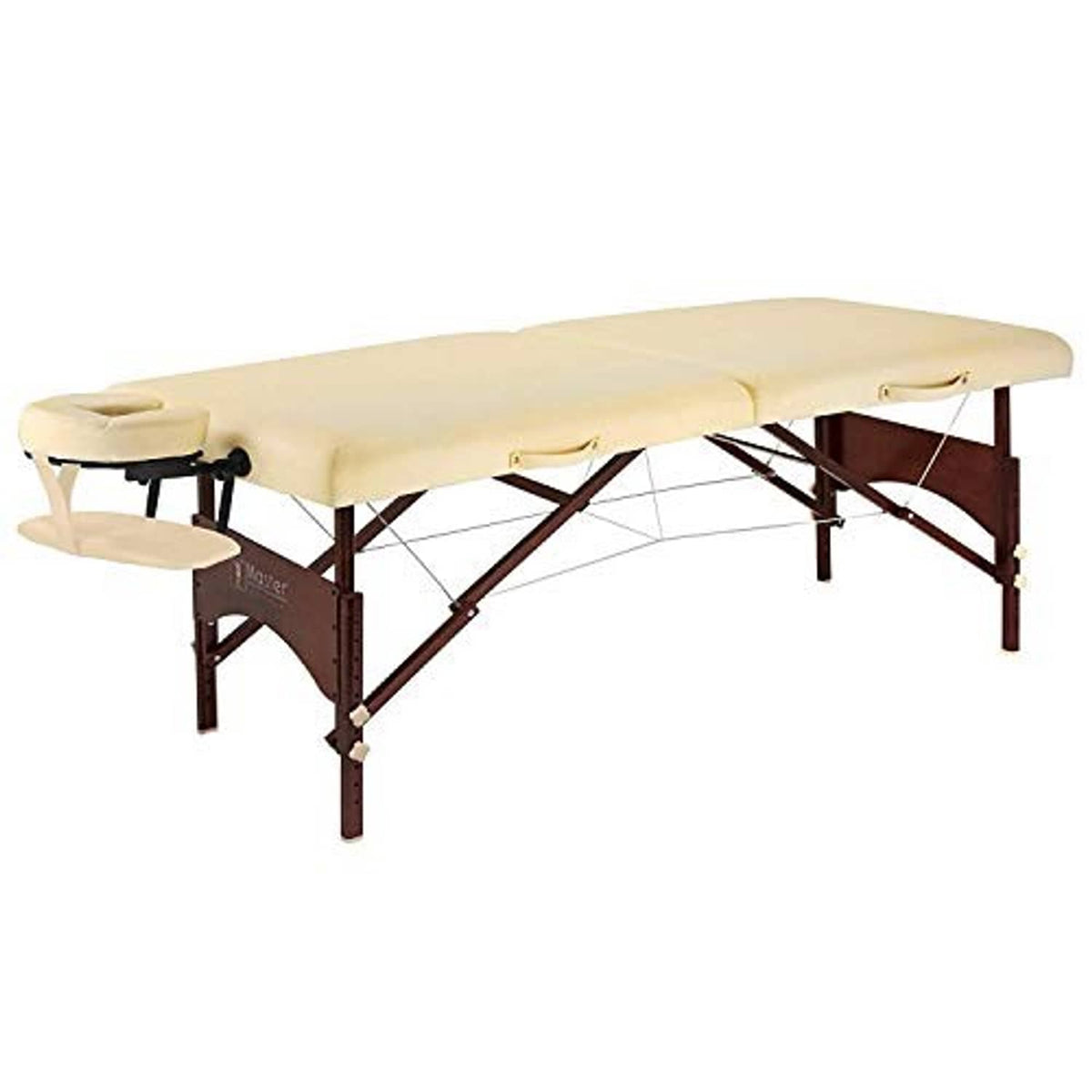 Portable massage table with cream upholstery, walnut frame, and adjustable support legs