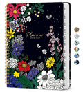 Floral spiral-bound academic planner cover with dark blue night garden design