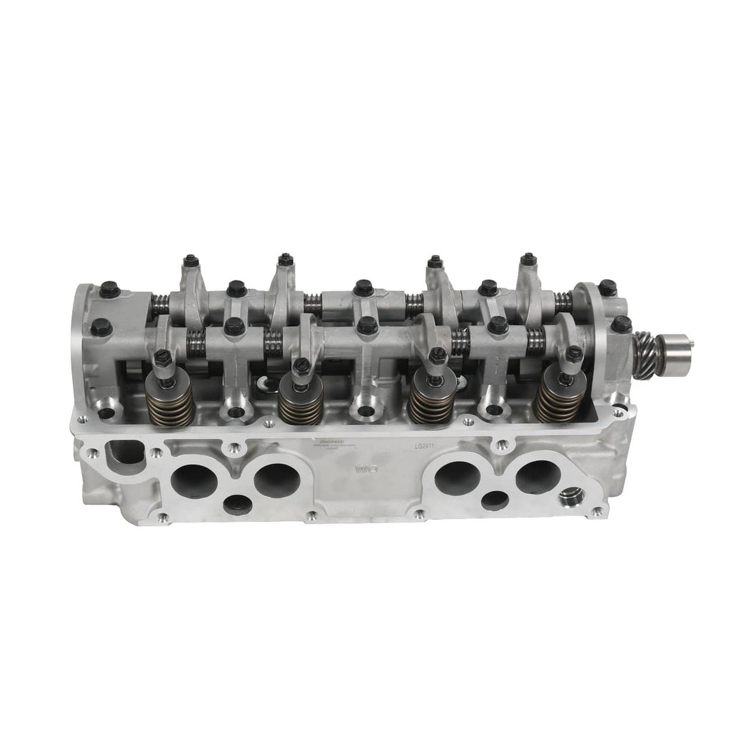 Cylinder head assembly straight side view with camshaft, rocker arms, and ports