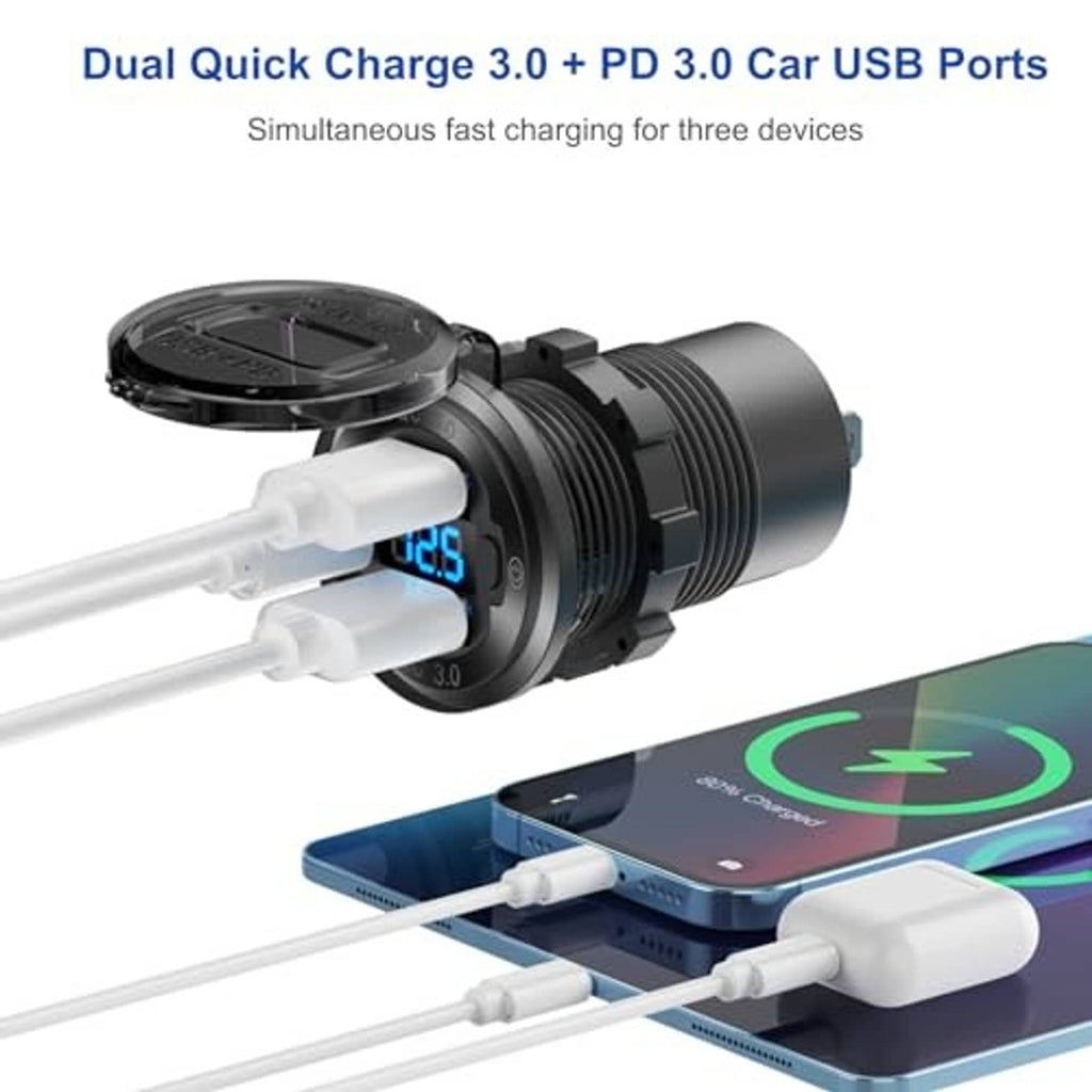 Black 12V USB outlet with recessed ports, blue charging ring, and connected USB cables