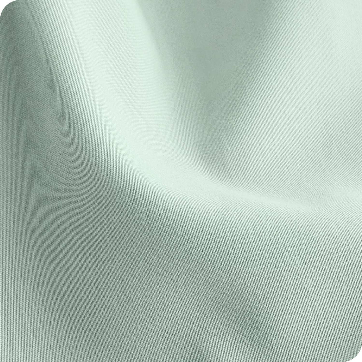 Mint green microfiber fabric with fine woven texture close-up