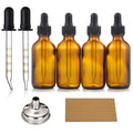 Set of amber glass dropper bottles with black caps and clear graduated pipettes