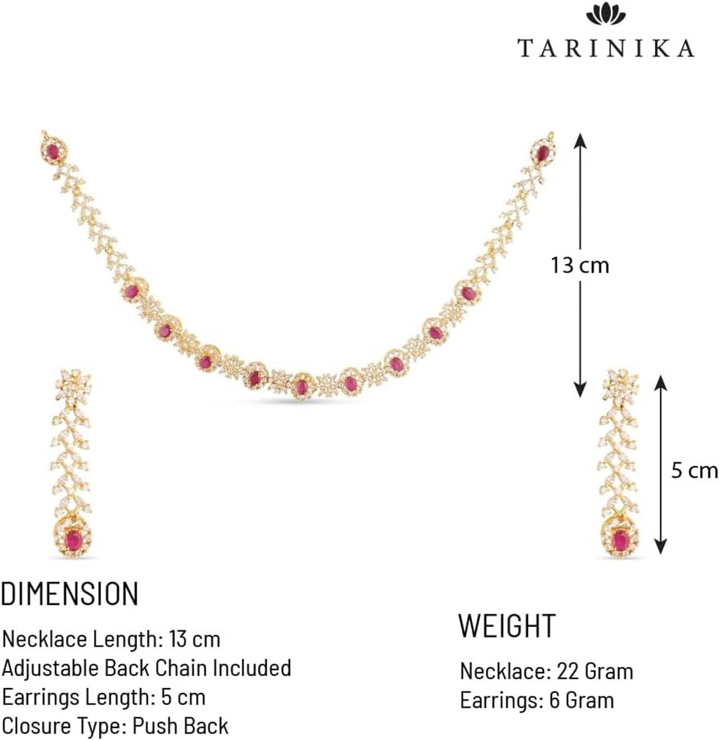 Gold-tone short CZ necklace with purple teardrop stones and floral accents; earrings
