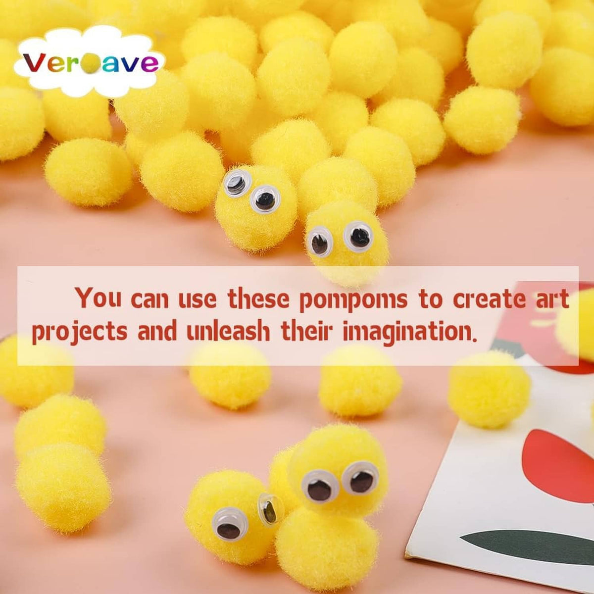 Close-up of yellow pom poms with small googly-eye decorations