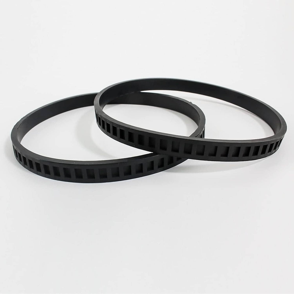 Black rubber bandsaw pulley tire set with two overlapping looped belts and toothed edges
