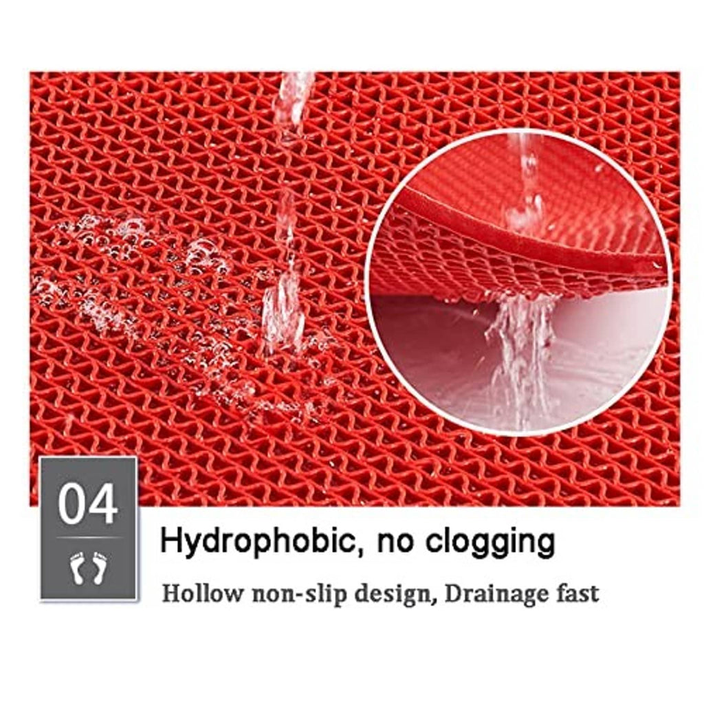 Red PVC drainage mat with water flowing through raised mesh surface